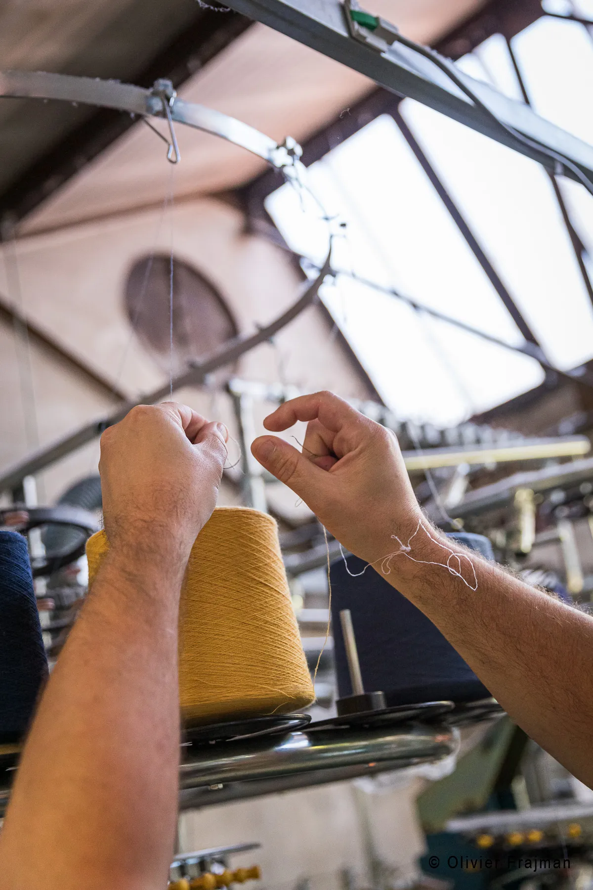 installation de bobines sur machine fabrication bonneterie france